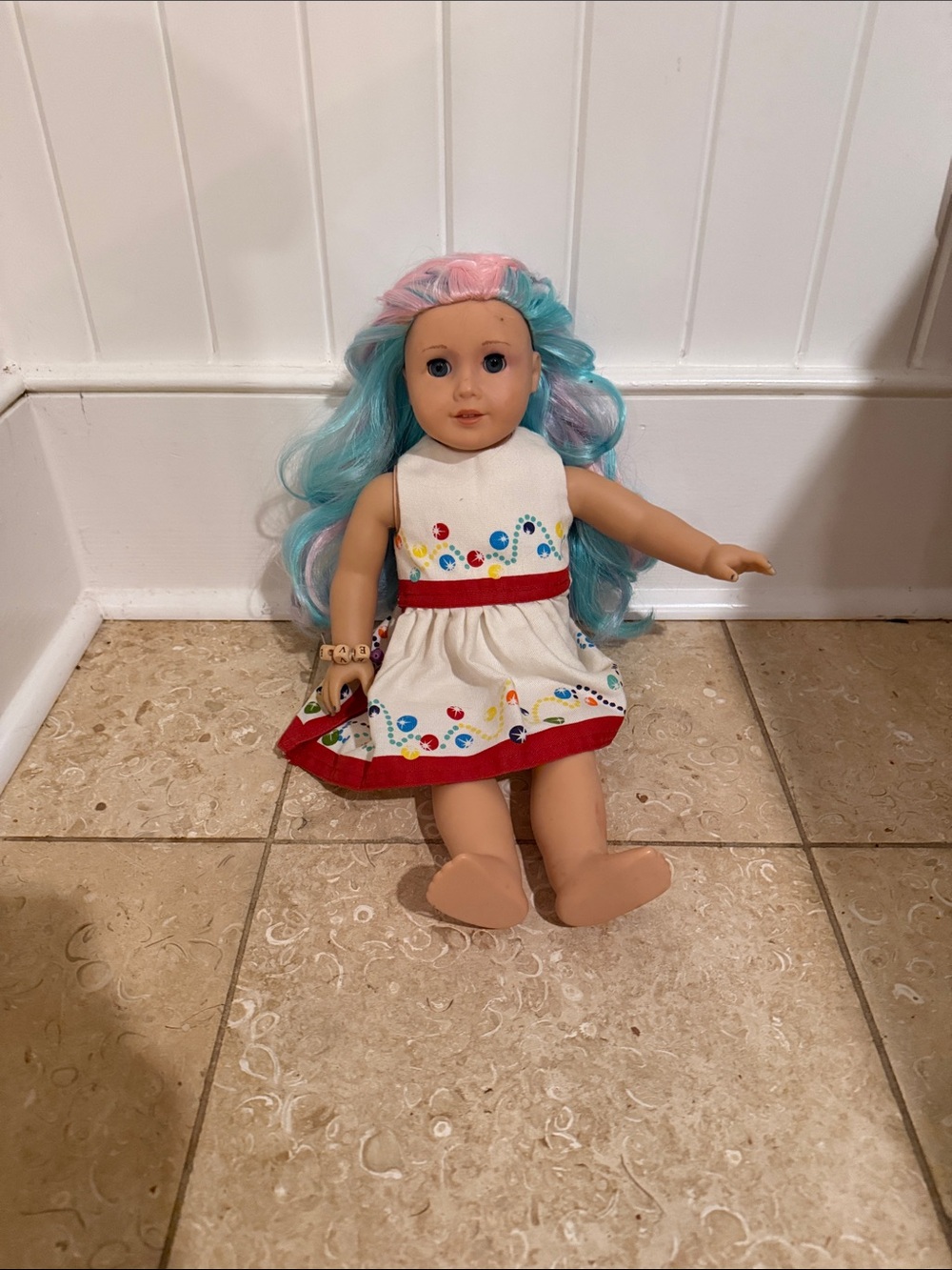 American Girl Doll with Blue and Pink Hair in White Dress
